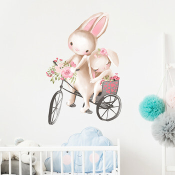 Wandaufkleber für das Kinderzimmer Bunnies on a Bike